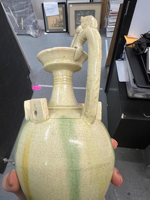 Lot 156 - A Chinese Sancai Glazed Pottery Ewer