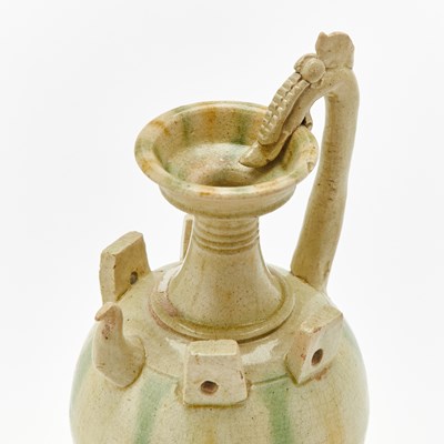 Lot 156 - A Chinese Sancai Glazed Pottery Ewer