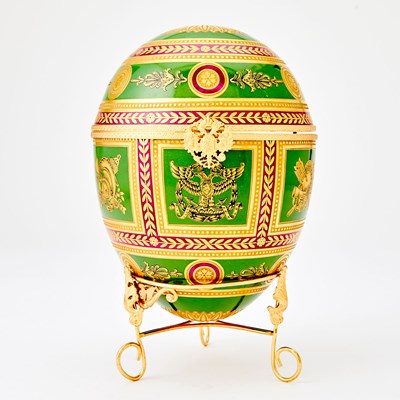 Lot 271 - Tatiana Fabergé Gilt-Metal Mounted Porcelain Egg-Form Box and Stand