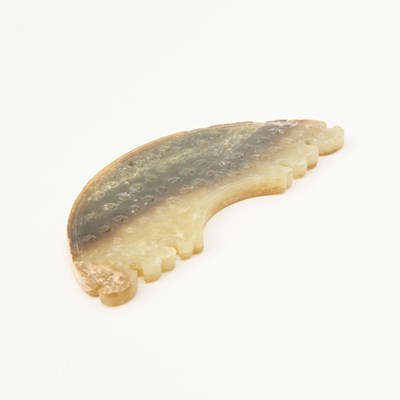 Lot 514 - A Chinese Archaistic Jade Carving