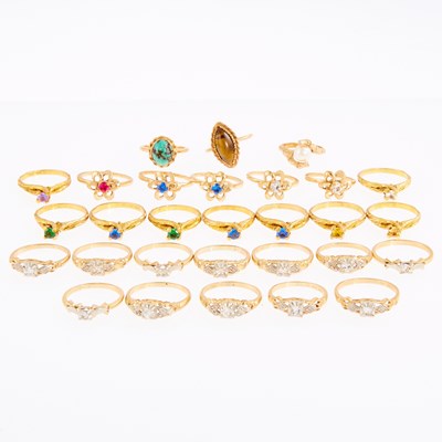 Lot 1296 - Group of Two-Color Low Karat Gold and Colored Stone Rings