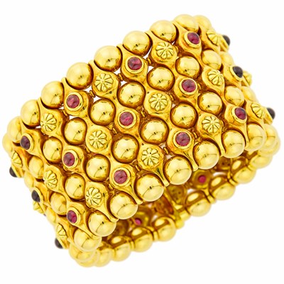 Lot 90 - Verdura Gold and Cabochon Garnet Cuff Bracelet