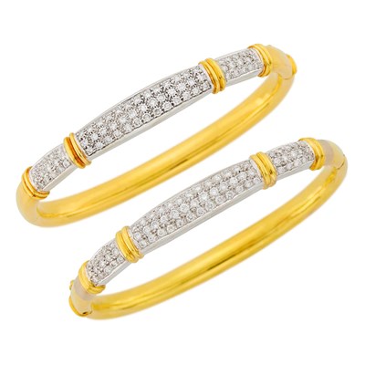 Lot 1037 - Pair of Two-Color Gold and Diamond Bangle Bracelets