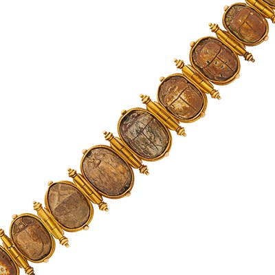 Lot 1072 - Egyptian Revival Gold and Hardstone Scarab Bracelet