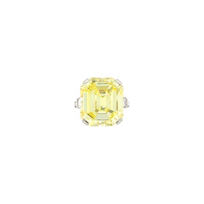 Lot 242 - Platinum, Fancy Intense Yellow Diamond and Diamond Ring