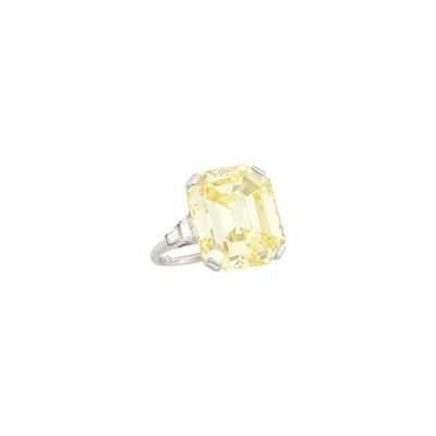 Lot 242 - Platinum, Fancy Intense Yellow Diamond and Diamond Ring