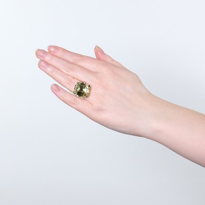 Lot 242 - Platinum, Fancy Intense Yellow Diamond and Diamond Ring