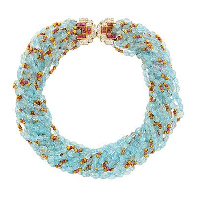 Lot 30 - Sixteen Strand Blue Topaz, Ruby and Gold Bead Torsade Necklace with Gold, Ruby and Diamond Clasp