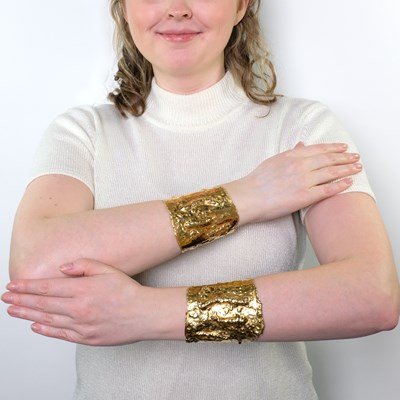 Lot 194 - Van Cleef & Arpels Pair of Gold 'Manchette' Cuff Bracelets