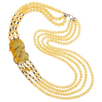 Lot 2128 - Long Triple Strand Yellow Jade Bead, Silver-Gilt and Carved Jade Fish Necklace