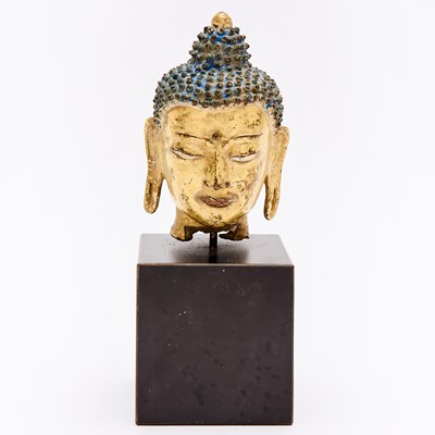 Lot 712 - A Sino-Tibetan Parcel Gilt Bronze Head of Buddha