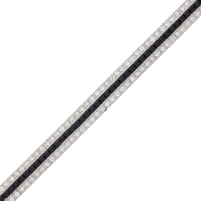Lot 1052 - Platinum, Diamond and Black Onyx Straightline Bracelet