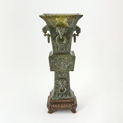 Lot 539 - A Chinese Spinach Jade Gu Vase and Stand