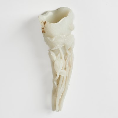 Lot 543 - A Chinese White Jade Lotus Grouping