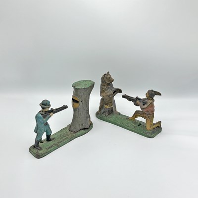 Lot 237 - Painted Cast Iron "Indian and Bear" and "Teddy and the Bear" Mechanical Banks