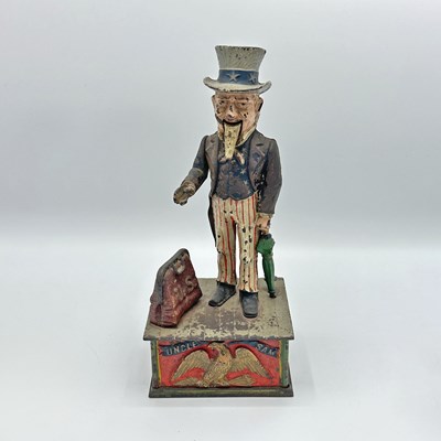 Lot 243 - Painted Cast Iron "Uncle Sam" Mechanical Bank