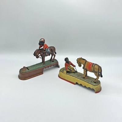 Lot 244 - Two Painted Cast Iron "Always Did 'Spise a Mule" Mechanical Banks