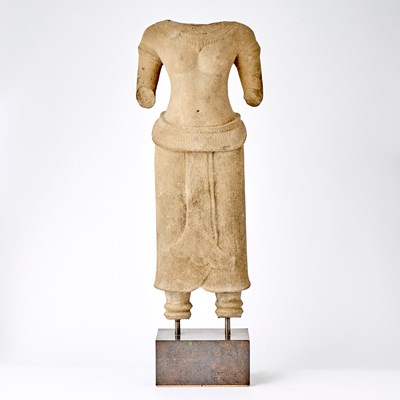 Lot 193 - A Khmer Gray Sandstone Torso of a Goddess