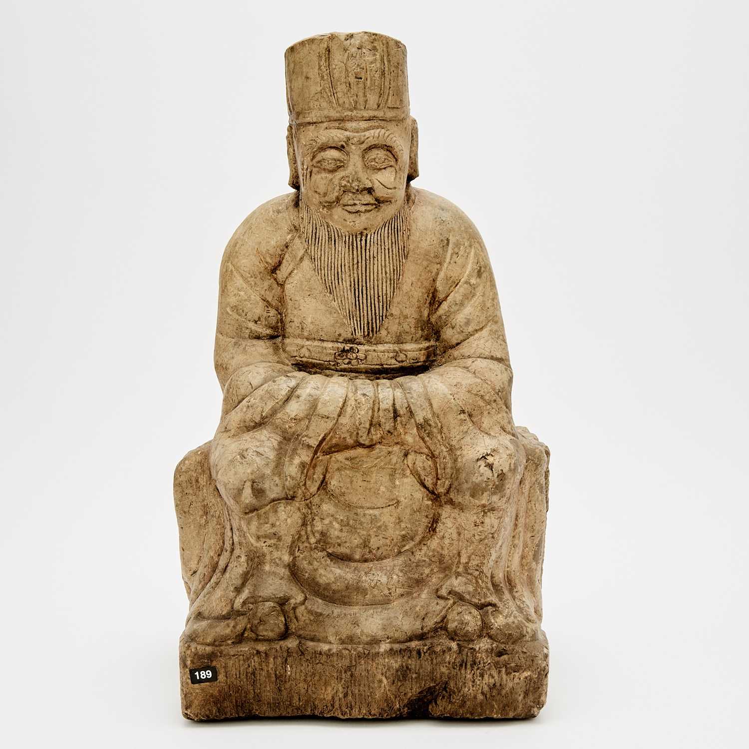 Lot 132 - A Chinese Stone Carving of a Daoist Figure