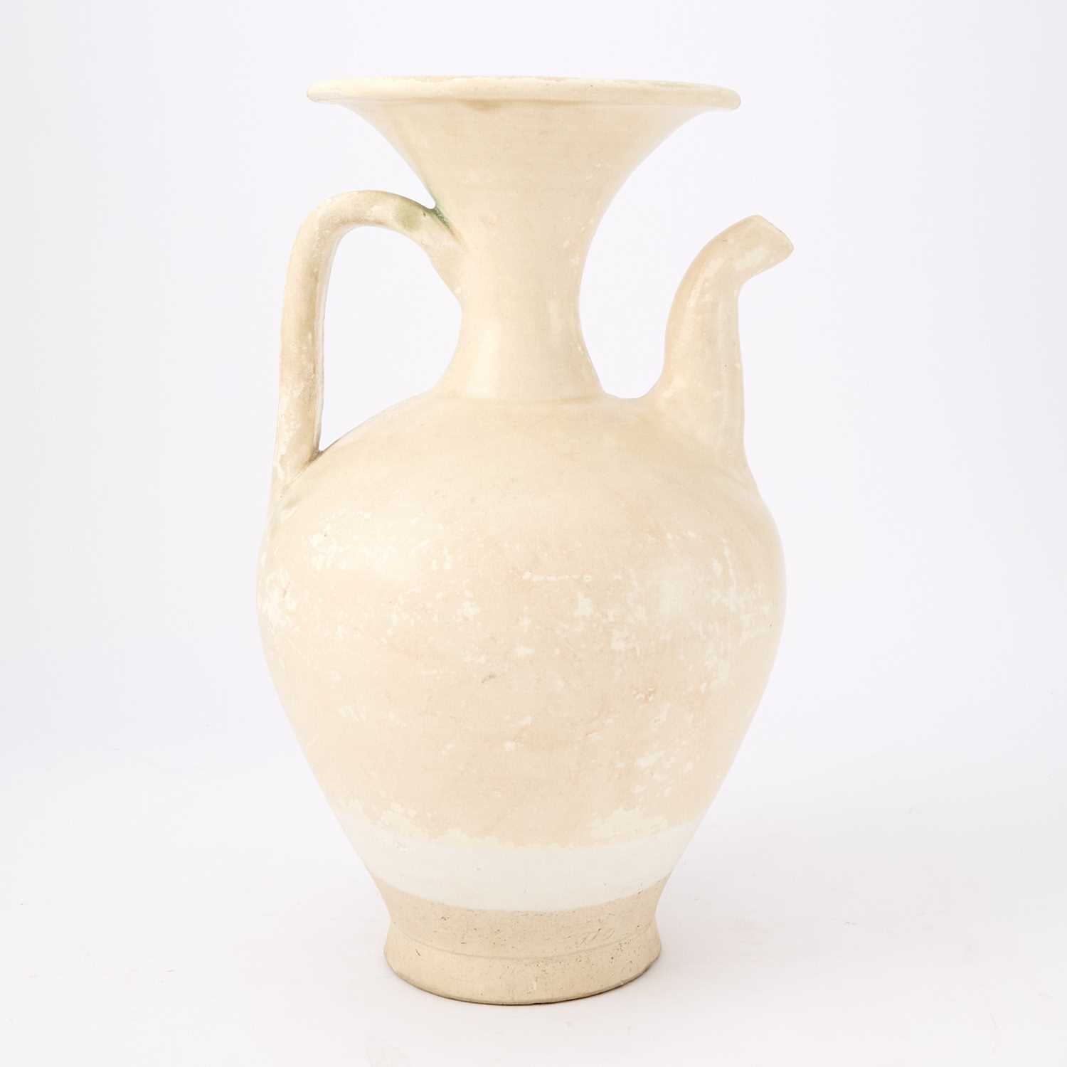 Lot 162 - A Chinese Cream Glazed Ewer
