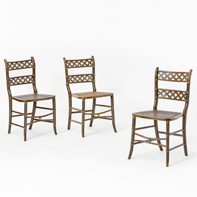 Lot 496 - Set of Regency Faux Rosewood and Parcel Gilt Side Chairs
