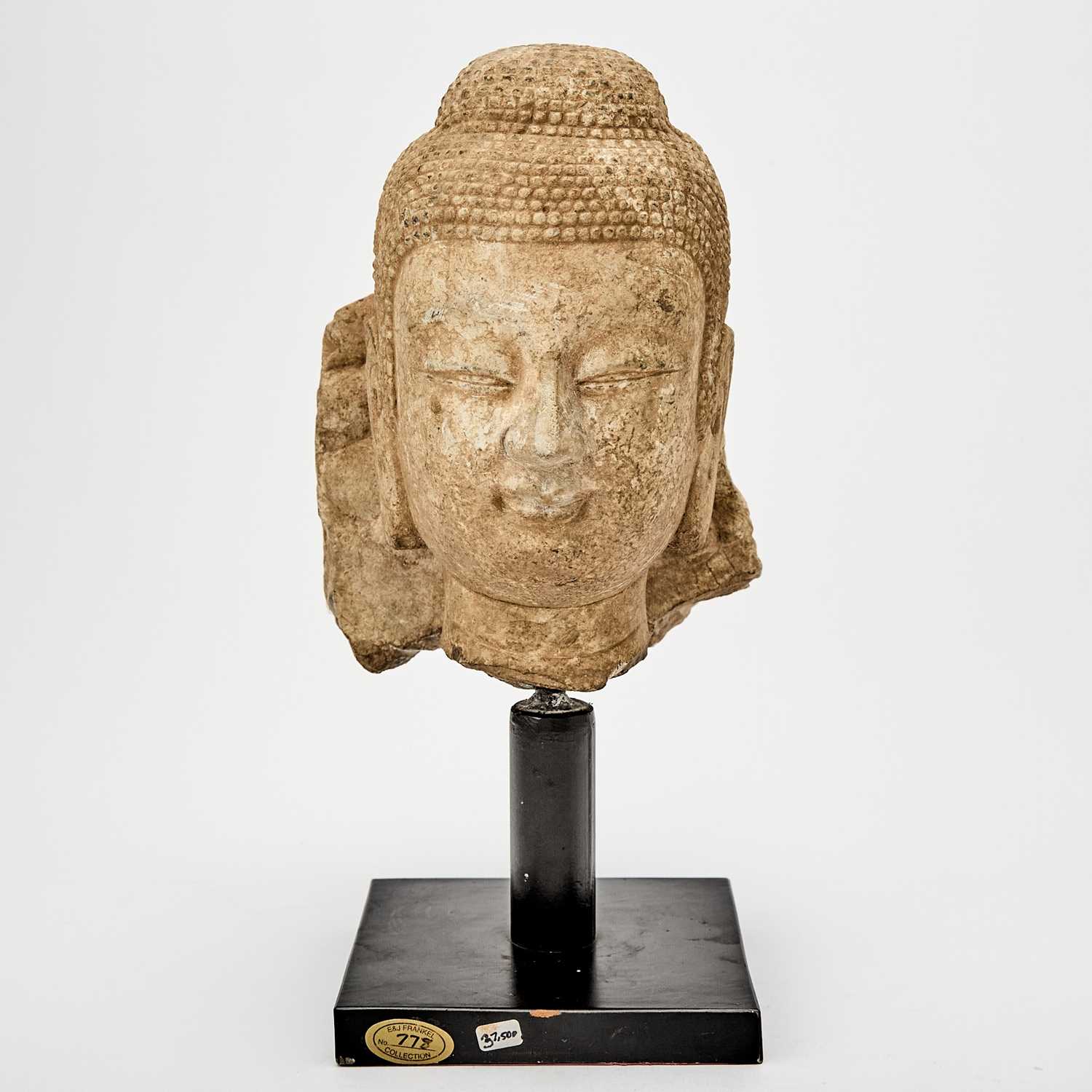 Lot 126 - A Chinese Carved Stone Fragmentary Head of Buddha