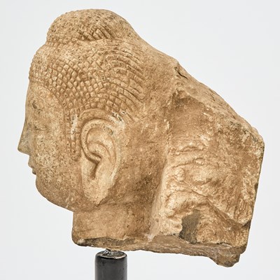 Lot 126 - A Chinese Carved Stone Fragmentary Head of Buddha