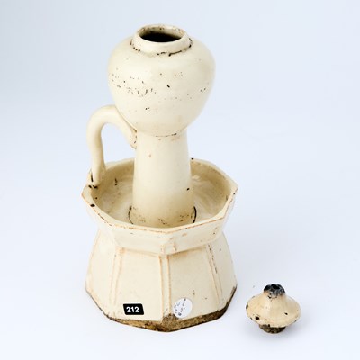 Lot 178 - A Chinese Earthenware Oil Lamp and Cover