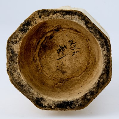 Lot 178 - A Chinese Earthenware Oil Lamp and Cover