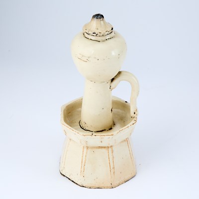 Lot 178 - A Chinese Earthenware Oil Lamp and Cover