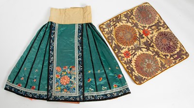 Lot 84 - A Chinese Embroidered Silk Winter Skirt and Brocade Pillow Cover
