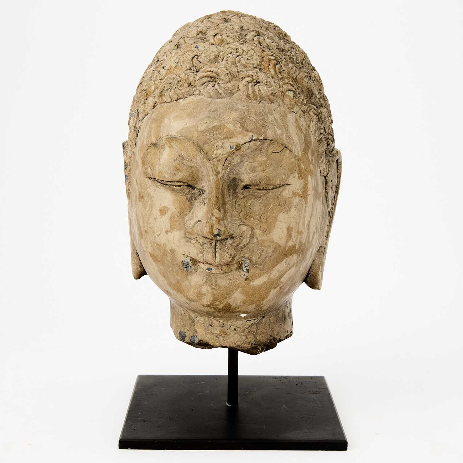 Lot 124 - A Chinese Carved Stone Head of Buddha