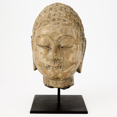 Lot 124 - A Chinese Carved Stone Head of Buddha