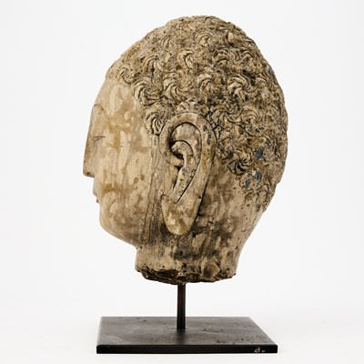 Lot 124 - A Chinese Carved Stone Head of Buddha