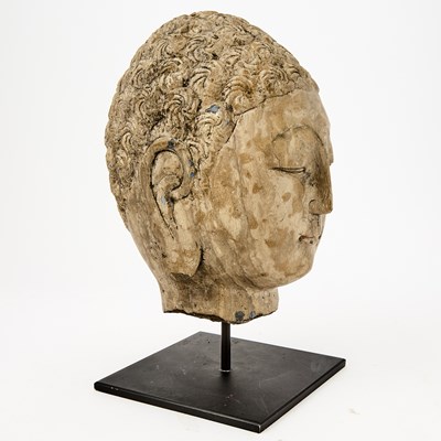 Lot 124 - A Chinese Carved Stone Head of Buddha