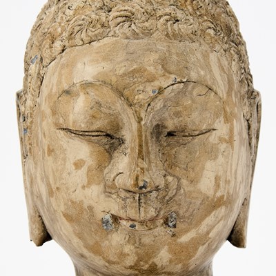Lot 124 - A Chinese Carved Stone Head of Buddha