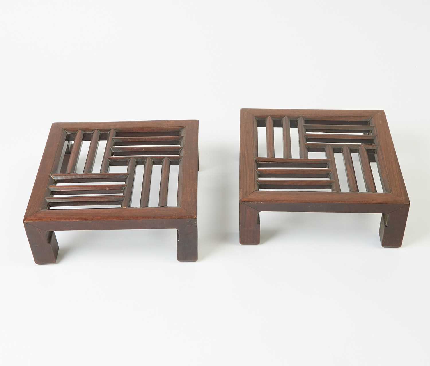 Lot 589 - A Pair of Chinese Hardwood Foot Stools