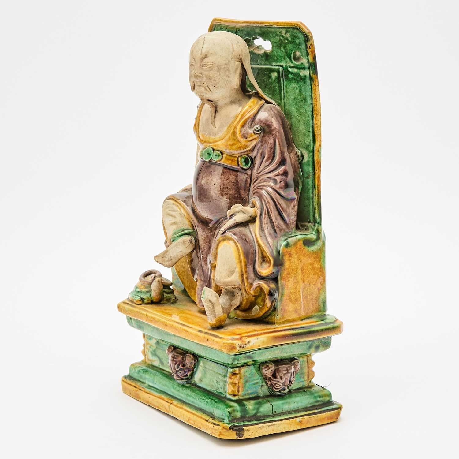 Lot 618 - A Chinese Sancai Glazed Pottery Figure of Chen Wu