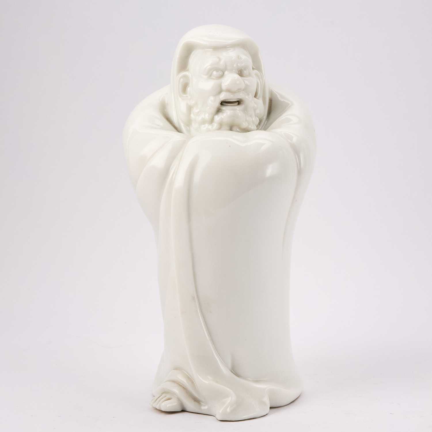 Lot 293 - A Chinese Dehua Porcelain Figure of Damo