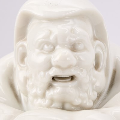 Lot 293 - A Chinese Dehua Porcelain Figure of Damo