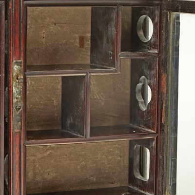 Lot 606 - A Pair of Chinese Hardwood Collector’s Cabinets
