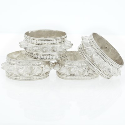 Lot 389 - Four Mixed Metal Cuff Bangle Bracelets