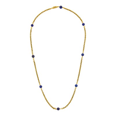 Lot 35 - Cartier Long Gold and Lapis Bead Chain Necklace