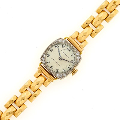 Lot 1076 - Tiffany & Co. Gold, Platinum and Diamond Watch with Gold Bracelet
