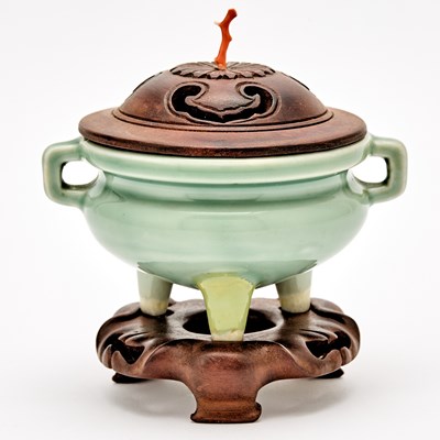 Lot 224 - A Chinese Celadon Glazed Tripod Censer and Stand
