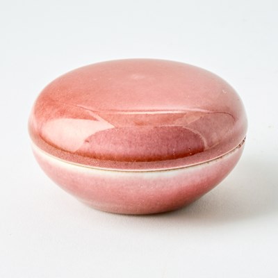 Lot 646 - A Chinese Peachbloom Glazed Porcelain Paste Box and Cover