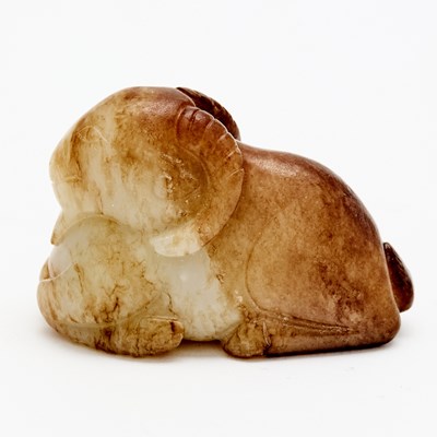 Lot 528 - A Chinese Russet Jade Ram