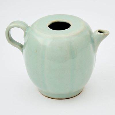 Lot 633 - A Chinese Pale Celadon Glazed Pouring Vessel