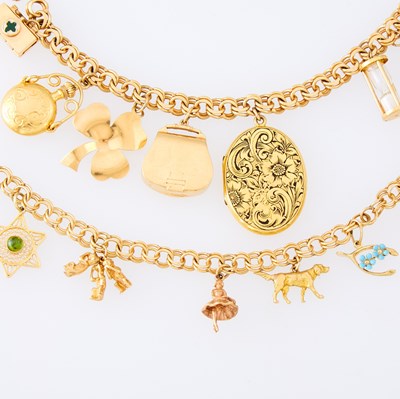 Lot 1135 - Two Gold and Gem-Set Charm Bracelets