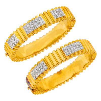 Lot 140 - Pair of Two-Color Gold and Diamond Bangle Bracelets